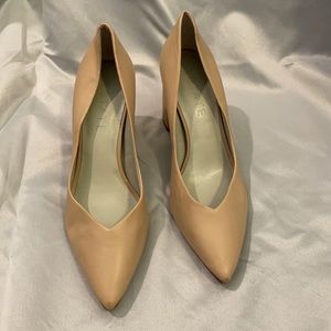 1. State nude pumps